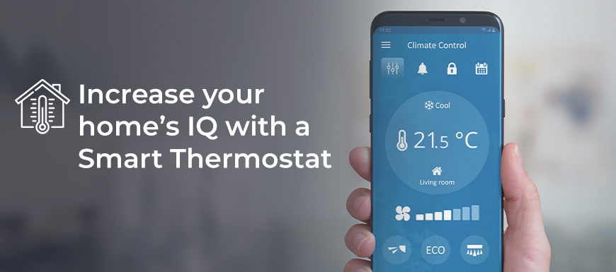 hand holding a Smart thermostat app